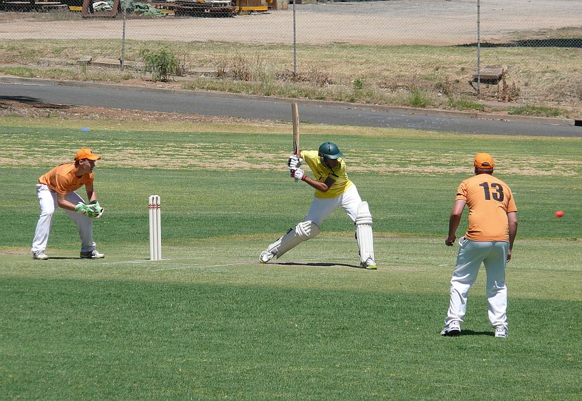 Imparja lad jumping out to drive.jpg